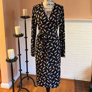 Ann Taylor L/S Wrap Around Cheetah Print on Black or Navy Blue Background.